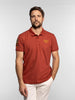 Polo manica corta in cotone piqué con patch ruggine